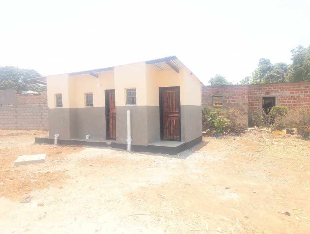 Completed building with community member